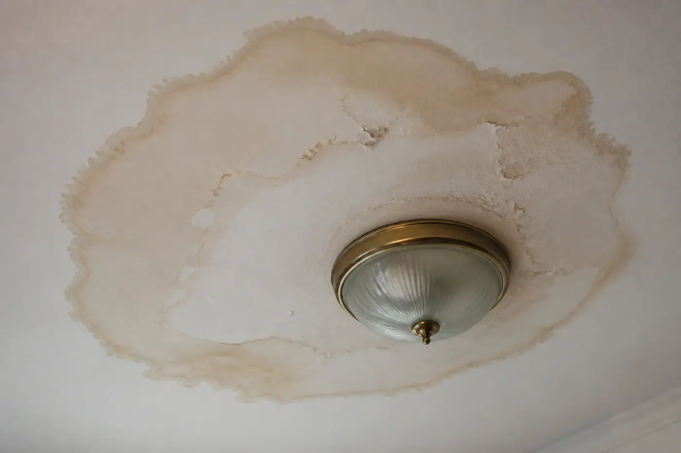 Interior ceiling water stain from a roof leak